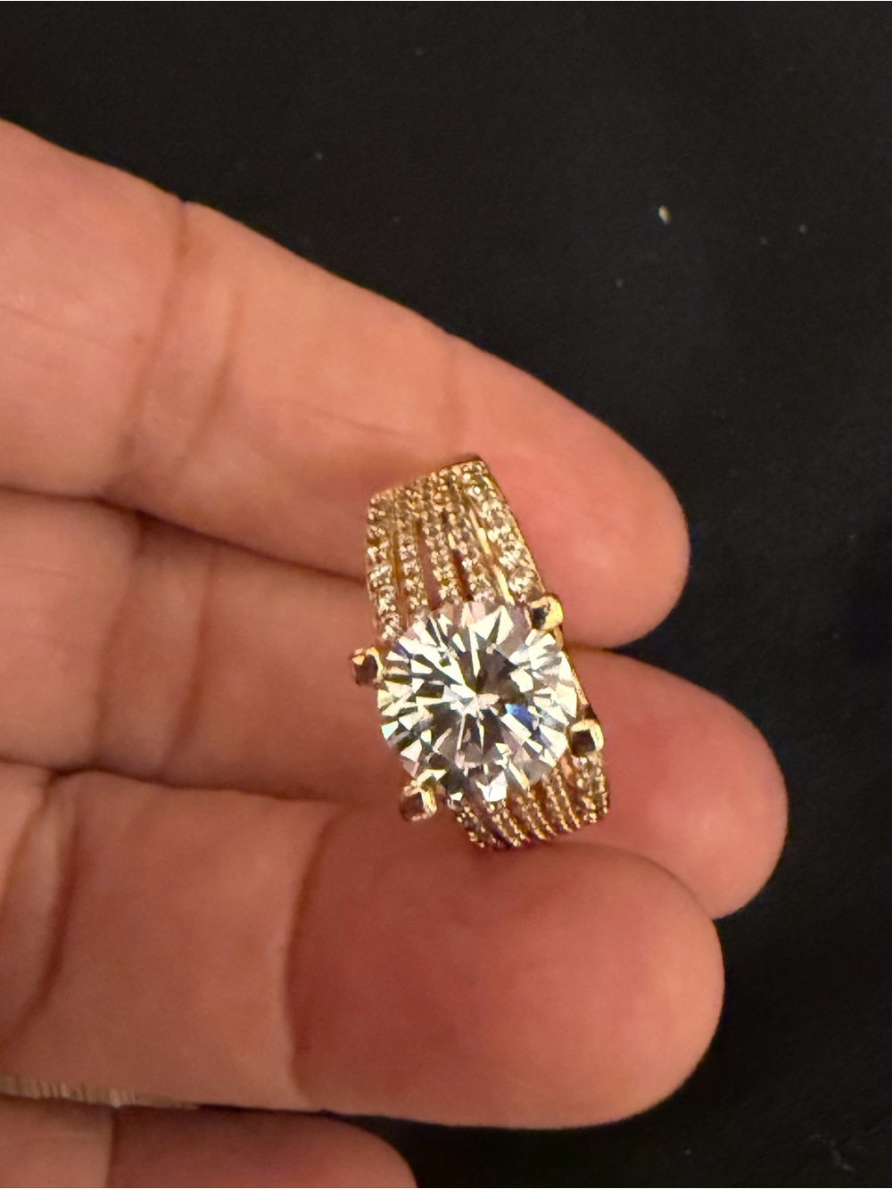 Elegant Gold-Tone Solitaire Ring with Clear Center Stone
